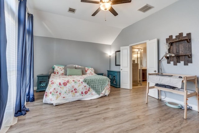 bedroom featuring vaulted ceiling, ceiling fan, and light hardwood / wood-style floors