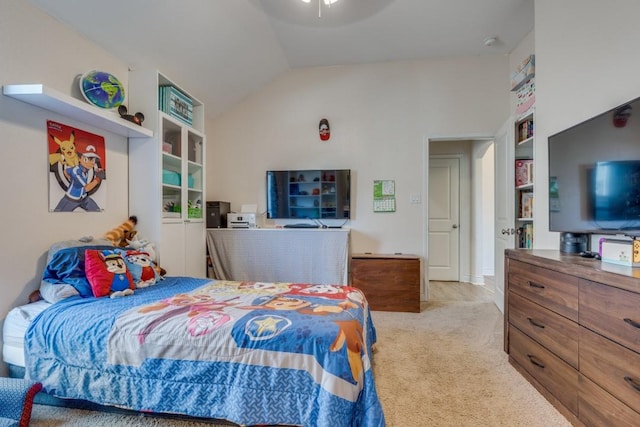 carpeted bedroom with lofted ceiling