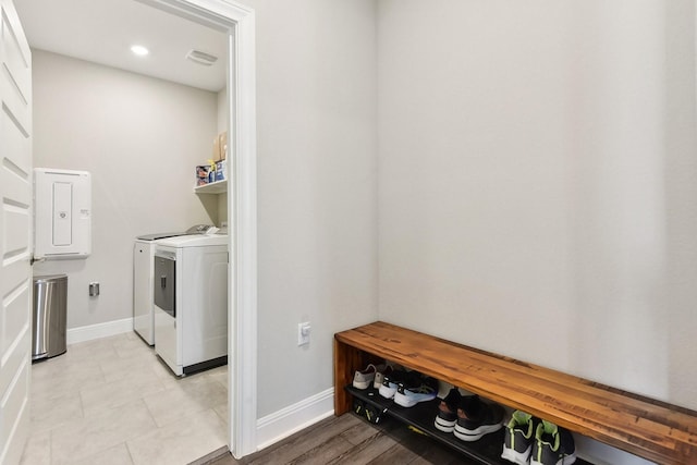 laundry room with independent washer and dryer