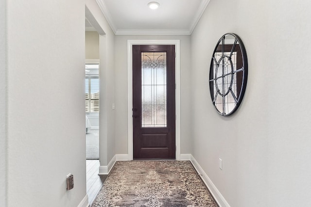 foyer featuring crown molding