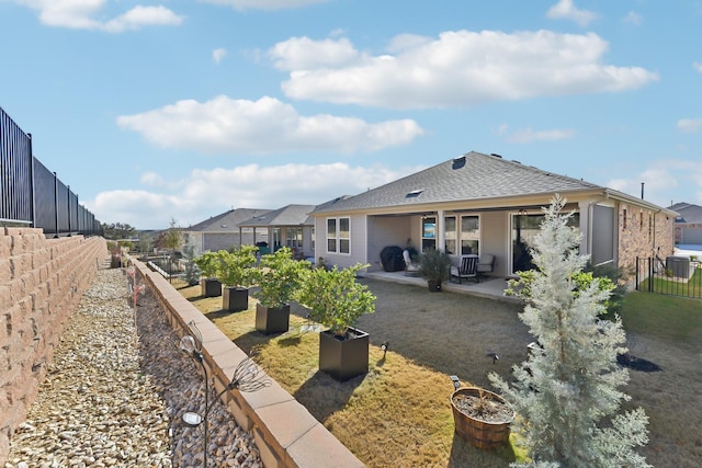 back of house featuring a patio