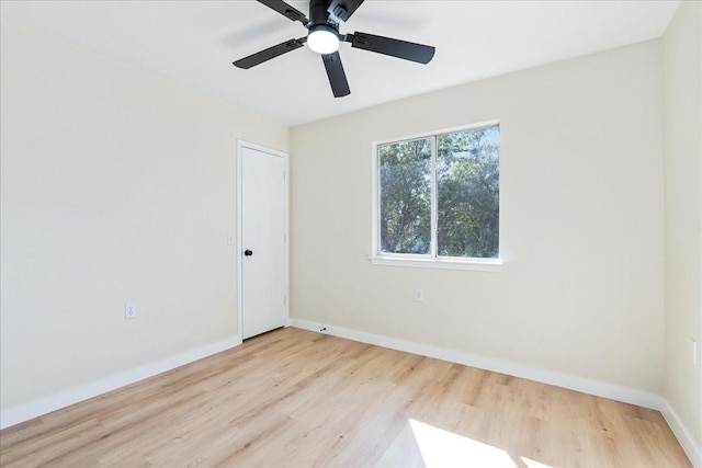 unfurnished room featuring ceiling fan and light hardwood / wood-style flooring