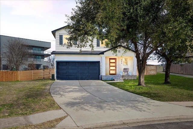 view of front of home featuring central AC, a garage, and a front yard