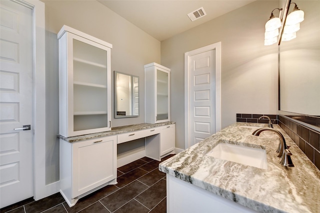 bathroom featuring vanity and tile patterned floors