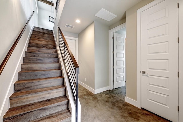 stairs with carpet floors