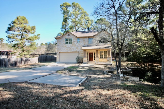 view of front facade featuring a garage and covered porch