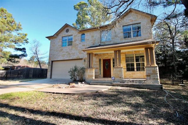 view of front of home featuring a garage and covered porch