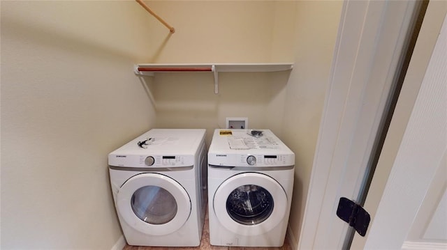 laundry room with washer and clothes dryer