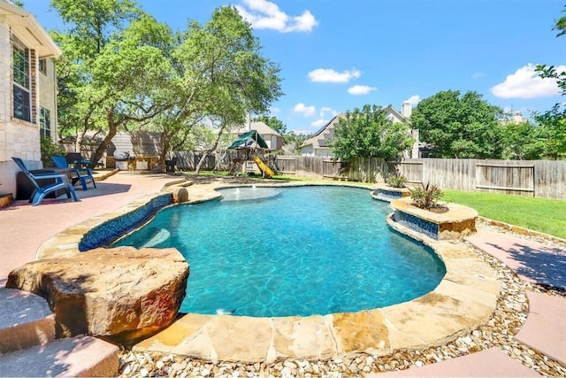 view of pool featuring a patio area and a playground