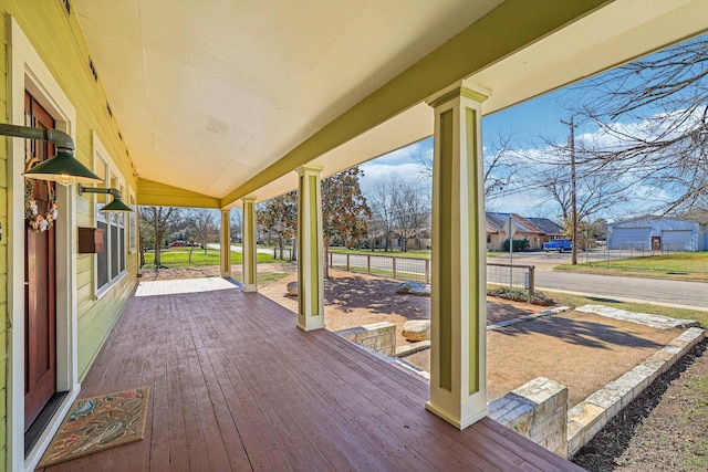 wooden deck featuring covered porch