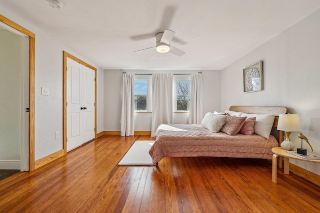 bedroom featuring ceiling fan and light hardwood / wood-style floors