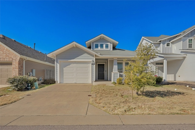 view of front of property featuring a garage and covered porch