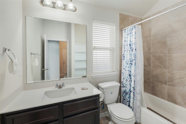 full bathroom with vanity, lofted ceiling, shower / tub combo with curtain, and toilet