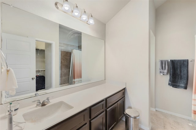 bathroom with vanity and curtained shower