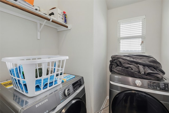 laundry room with washer and dryer