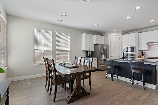 dining room with sink