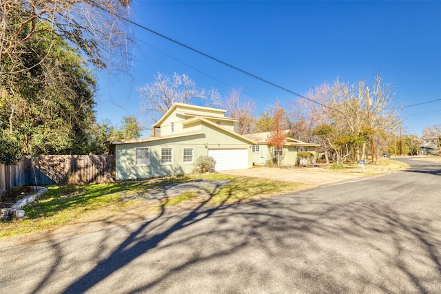 view of property exterior with a garage