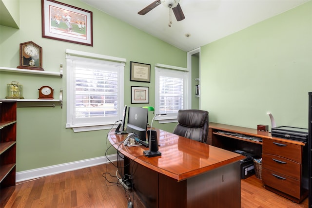 office area featuring lofted ceiling, hardwood / wood-style floors, and ceiling fan