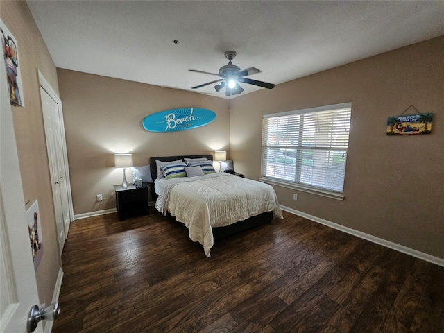 bedroom featuring dark hardwood / wood-style floors and ceiling fan