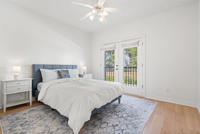 bedroom with french doors, ceiling fan, light wood-type flooring, and access to outside