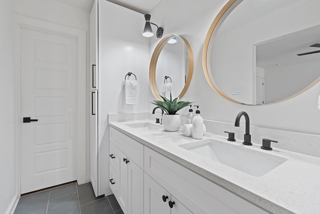 bathroom featuring tile patterned floors and vanity