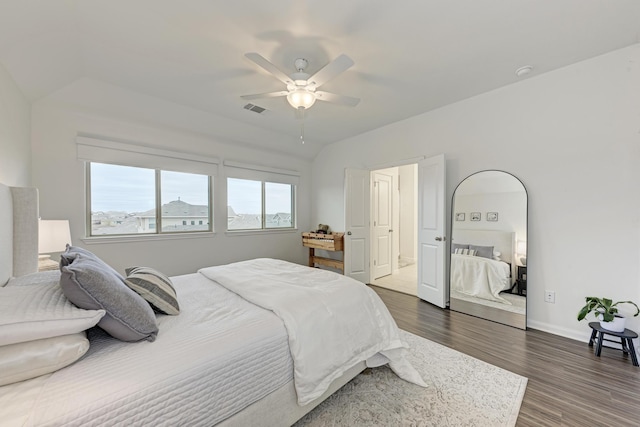 bedroom featuring dark hardwood / wood-style flooring and ceiling fan