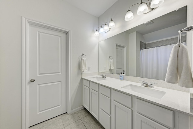 bathroom featuring vanity, tile patterned floors, and a shower with shower curtain