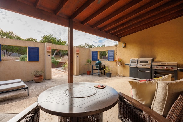 view of patio with a grill