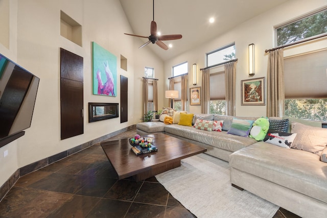 living room featuring high vaulted ceiling