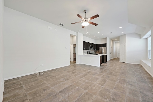 unfurnished living room with ceiling fan