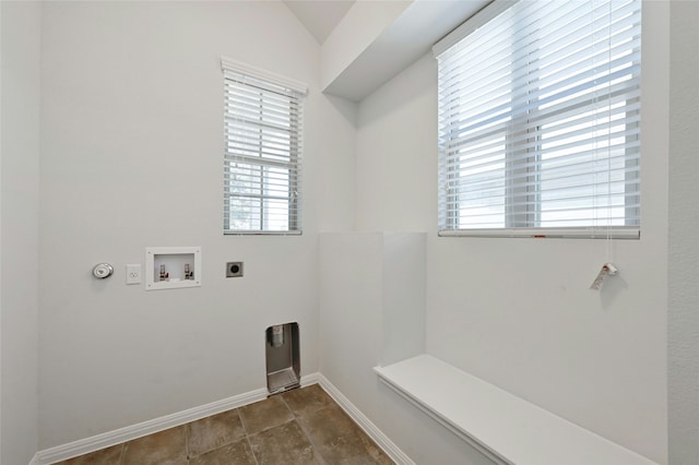 washroom featuring hookup for a gas dryer, hookup for a washing machine, a wealth of natural light, and hookup for an electric dryer