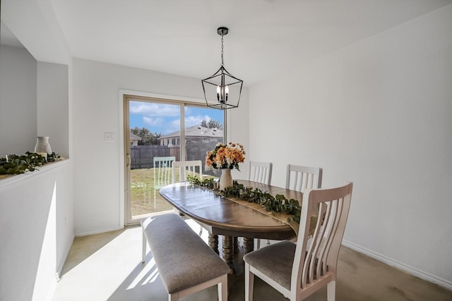 dining space with a chandelier