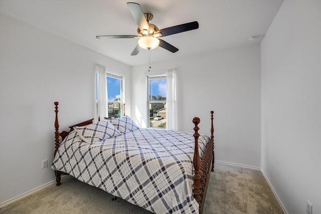 bedroom featuring ceiling fan and carpet floors