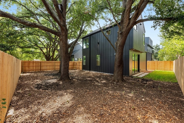 2010 Gathright Unit B, Austin, TX 78704 - back of property with a fenced backyard and board and batten siding
