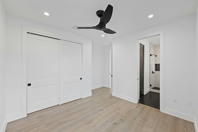 2010 Gathright Unit B, Austin, TX 78704 - unfurnished bedroom featuring light wood finished floors, recessed lighting, a closet, connected bathroom, and a ceiling fan