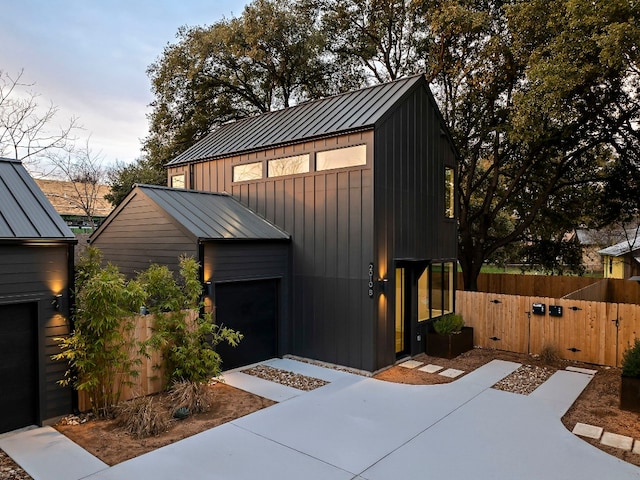 2010 Gathright Unit B, Austin, TX 78704 - view of front of home featuring a gate, board and batten siding, a standing seam roof, and a metal roof
