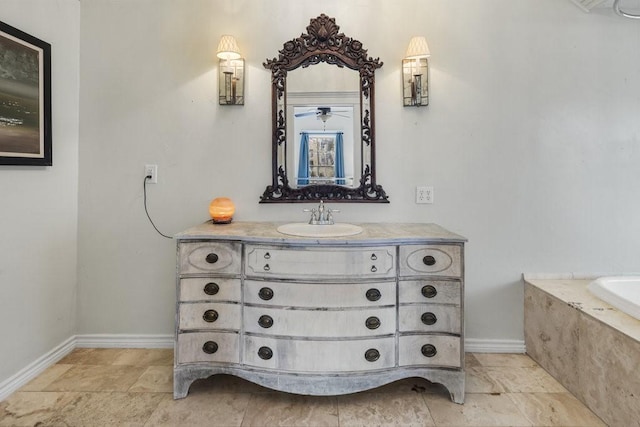 bathroom featuring vanity and a bathtub