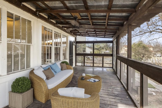 sunroom with beam ceiling