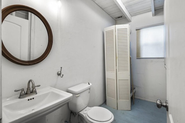 bathroom featuring sink, wood ceiling, lofted ceiling with beams, and toilet