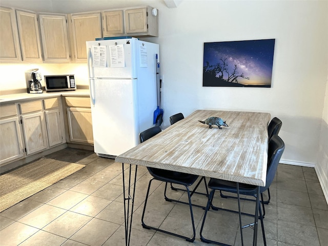 view of tiled dining area