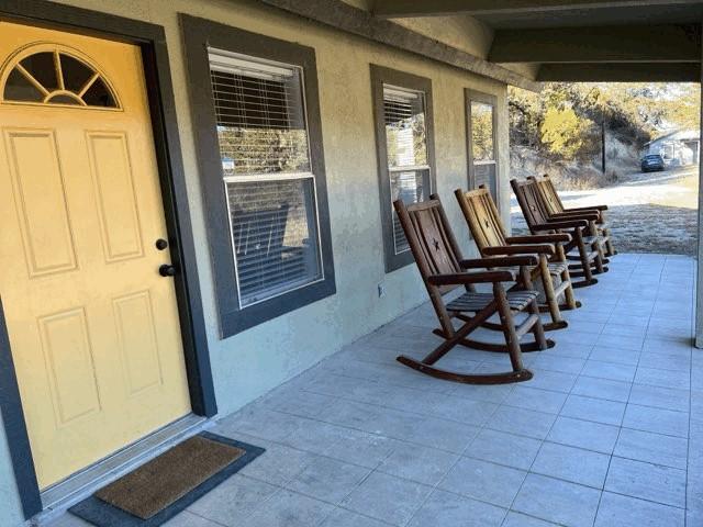 property entrance featuring covered porch