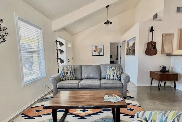 tiled living room with vaulted ceiling with beams