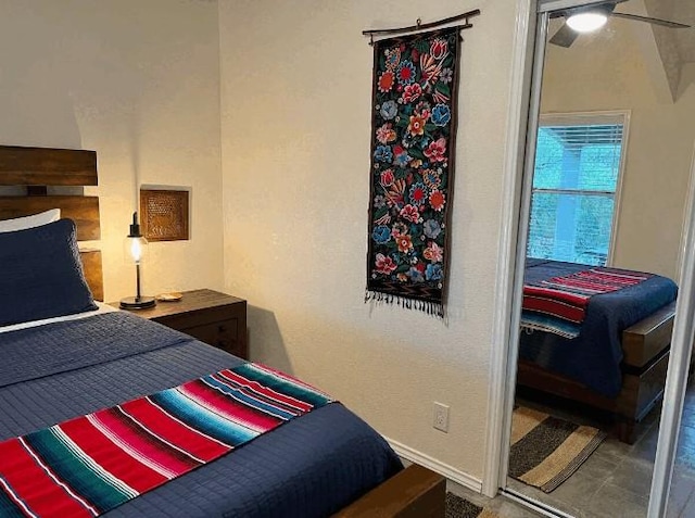 bedroom featuring ceiling fan