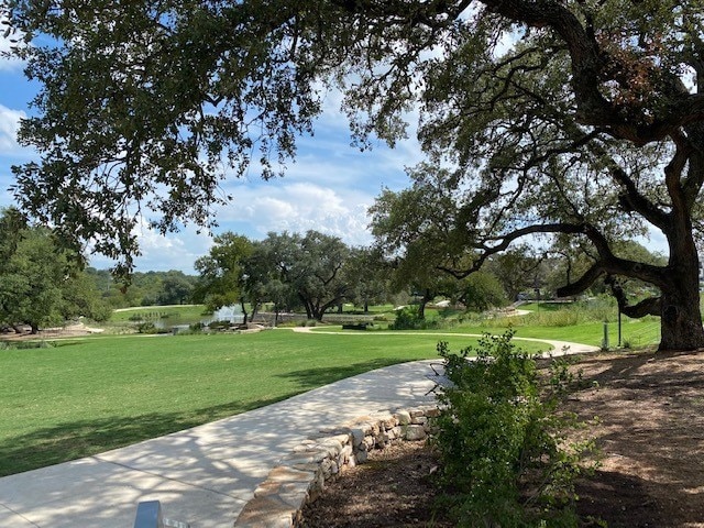 view of community featuring a yard