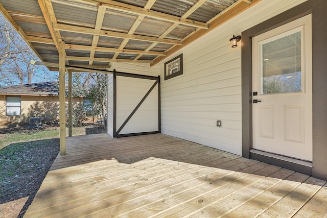 wooden terrace featuring central AC