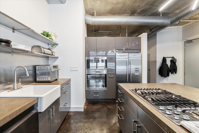 kitchen with appliances with stainless steel finishes and sink