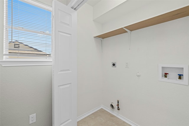 clothes washing area with gas dryer hookup and hookup for a washing machine