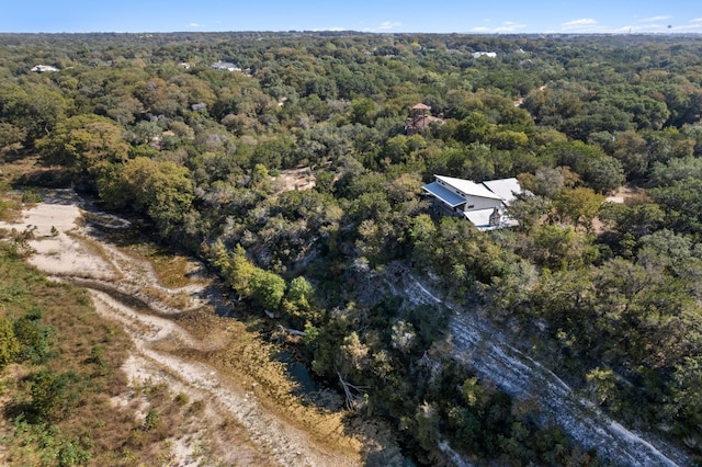 212 Comanche Cp, Kyle, TX 78640 - aerial view of property's location featuring a heavily wooded area