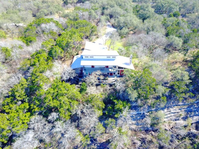 212 Comanche Cp, Kyle, TX 78640 - view of subject property with a heavily wooded area
