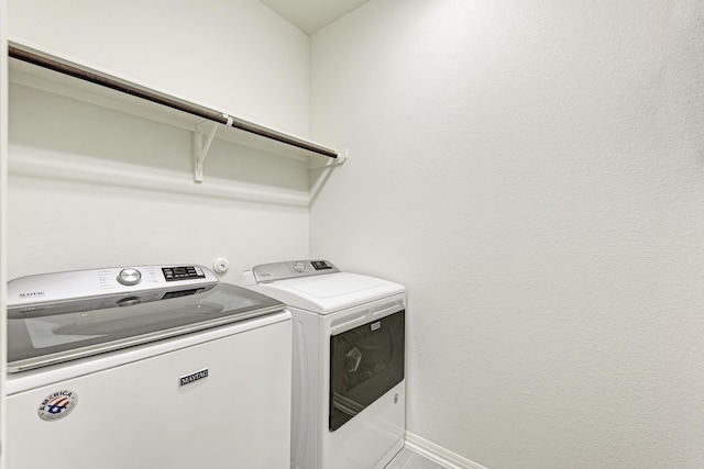 washroom featuring separate washer and dryer